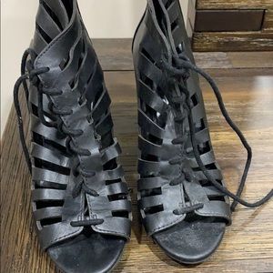 Black heels. Never worn.